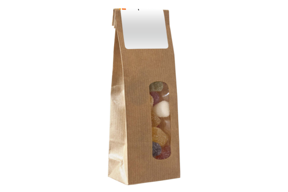 A brown paper bag featuring a full-colour printed sticker and containing A-filling - Marshfield