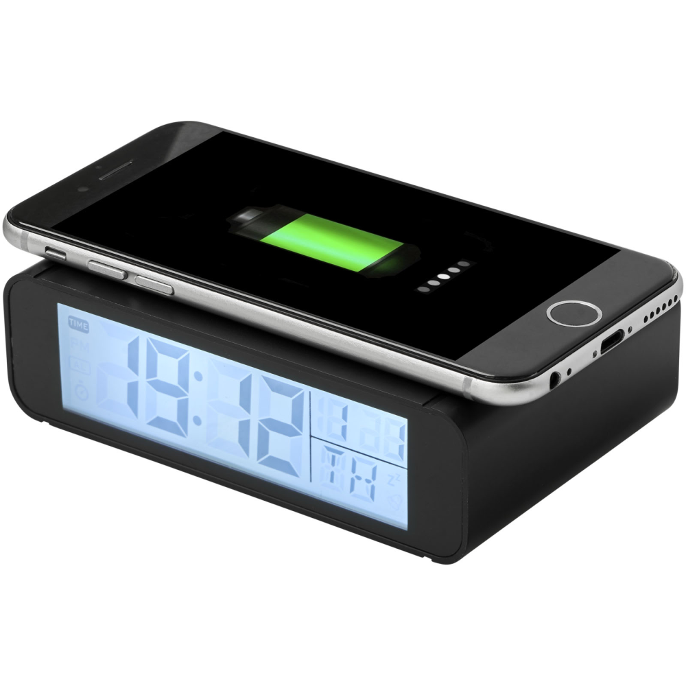 This is a clock that not only displays seconds but also supports wireless charging. Additionally, it features an alarm function. - Great Packington