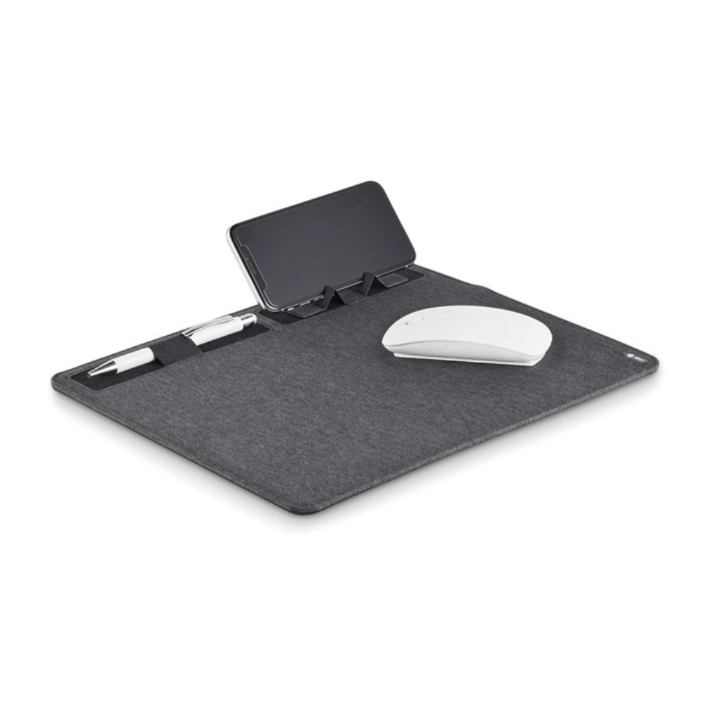 This is a multifunctional mouse mat made from 2-tone 300D polyester RPET. It features a wireless charger and a phone stand. - Lulworth Cove