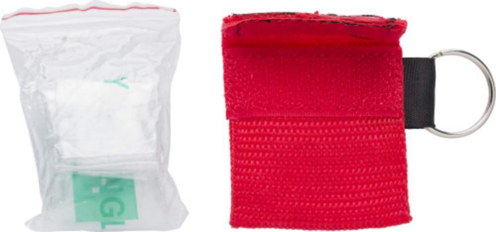 A plastic CPR mask that comes in a sealed polyester bag with a velcro closure - Piddletrenthide - Sleaford