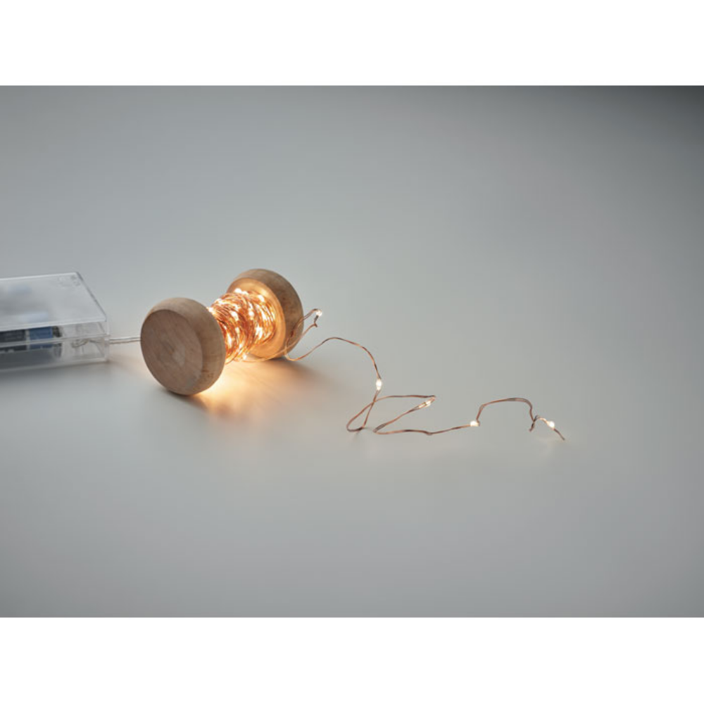 Luci di fata a LED su rocchetto di legno - Castelcovati