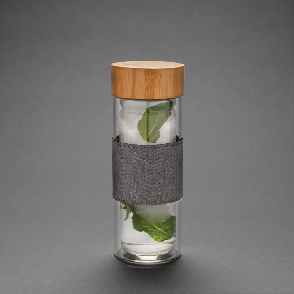 Impact resistant glass bottle featuring double walls for insulation, complete with a bamboo lid. - Ditchling