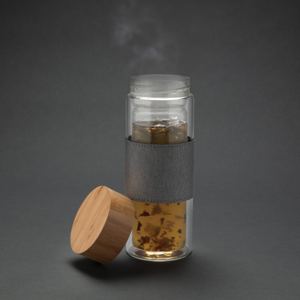 Impact resistant glass bottle featuring double walls for insulation, complete with a bamboo lid. - Ditchling
