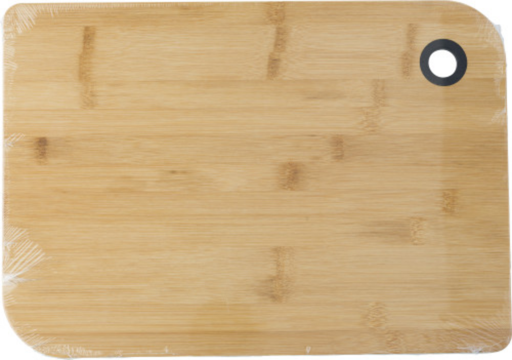 A bamboo cutting board that is outlined with a silicone ring. - Piddletrenthide
