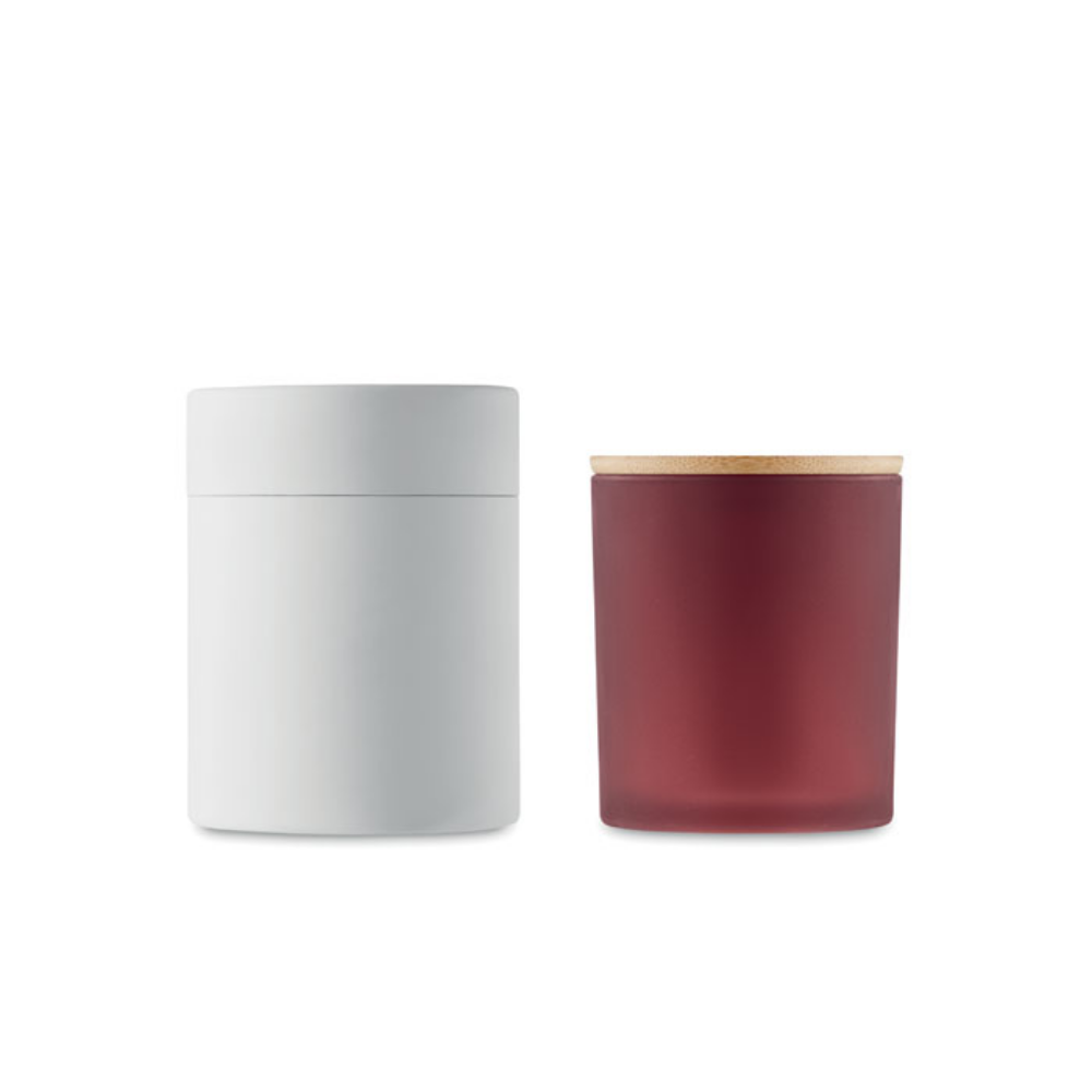 A scented candle made from plant-based wax in a frosted glass jar with a bamboo lid - Embleton