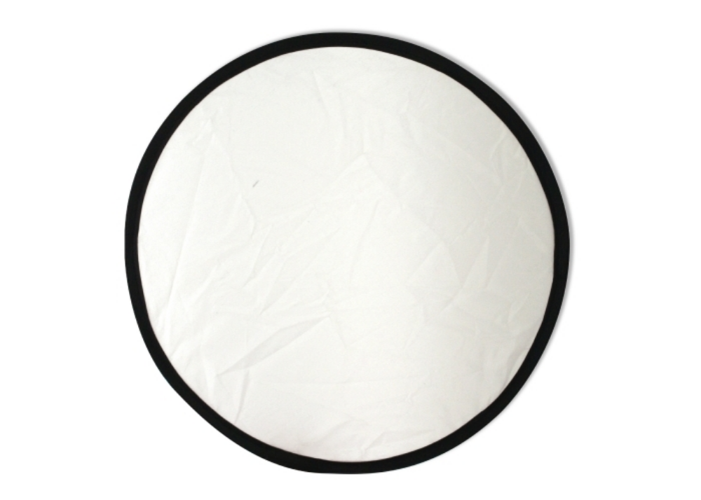 A frisbee made of nylon that can be folded and comes with a pouch - Barkby Thorpe